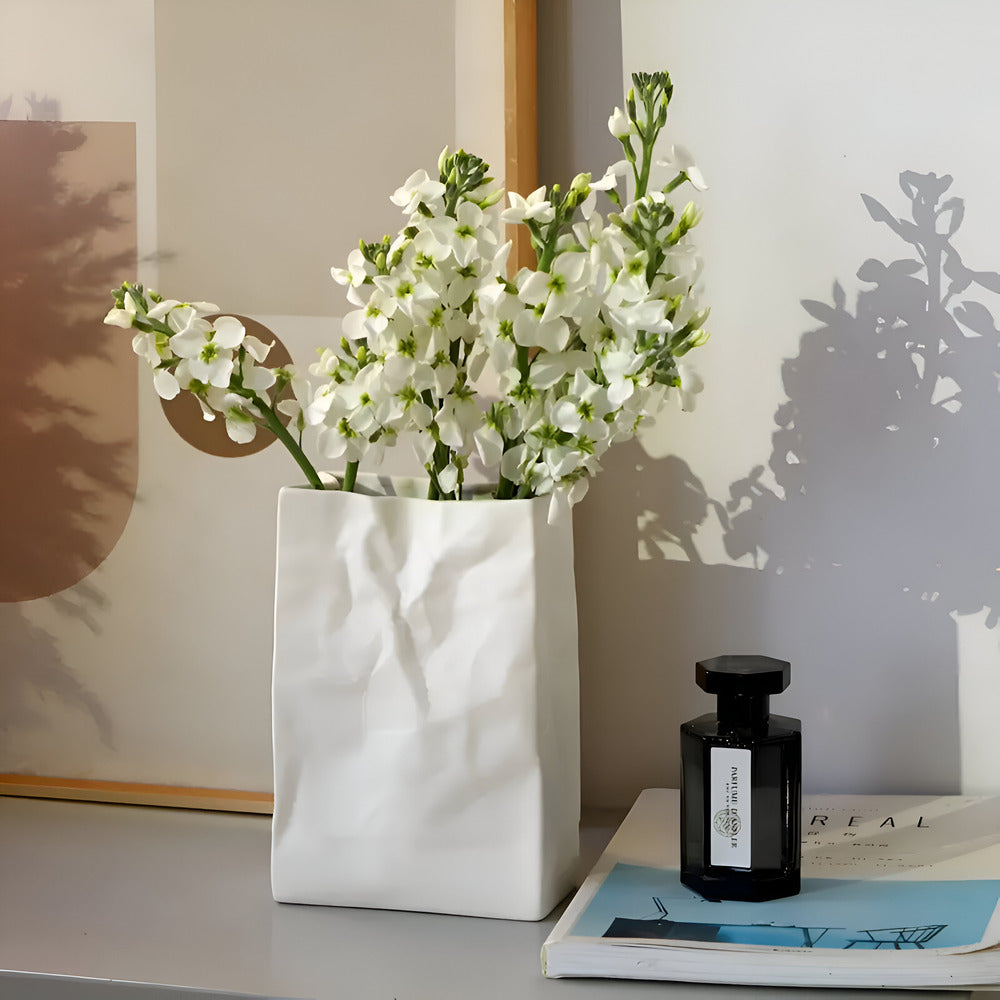 Elegant Ceramic Vase with Textured Paper Bag Design
