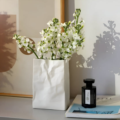 Elegant Ceramic Vase with Textured Paper Bag Design