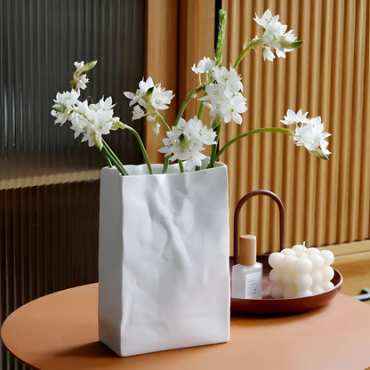 Elegant Ceramic Vase with Textured Paper Bag Design