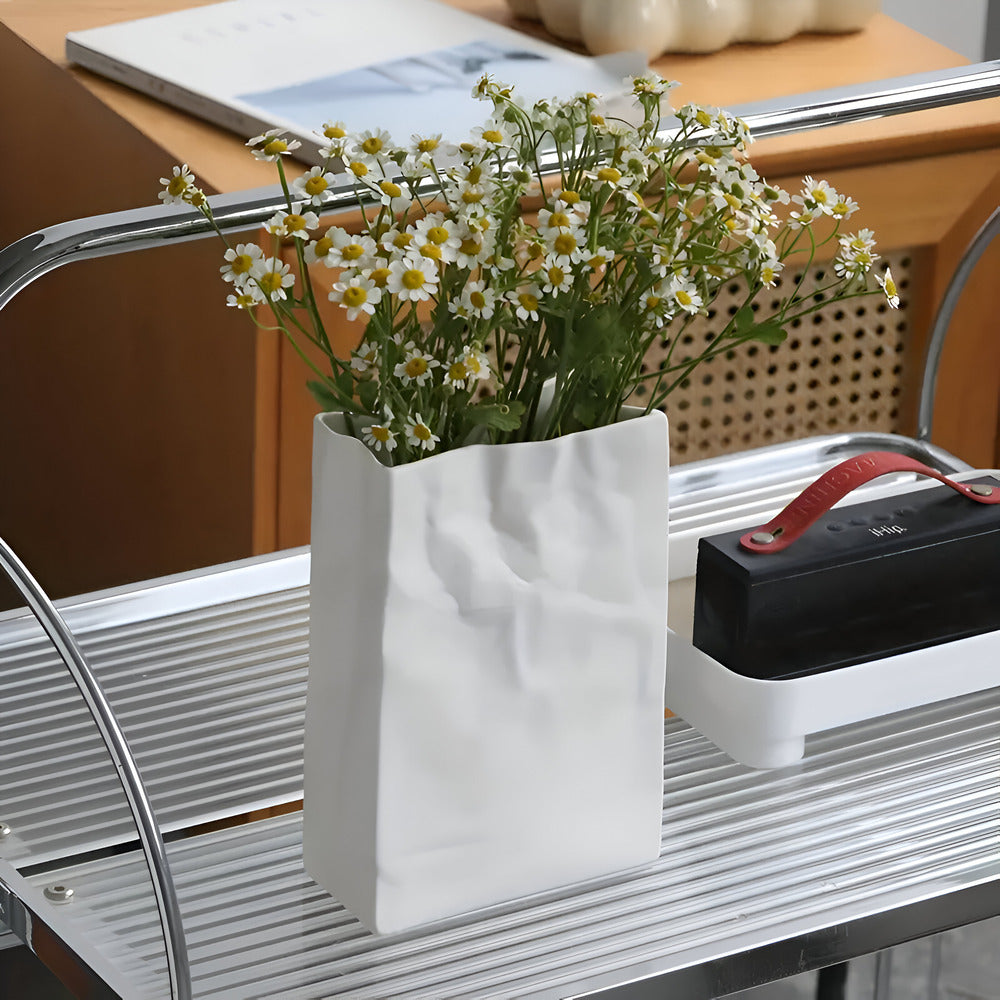 Elegant Ceramic Vase with Textured Paper Bag Design
