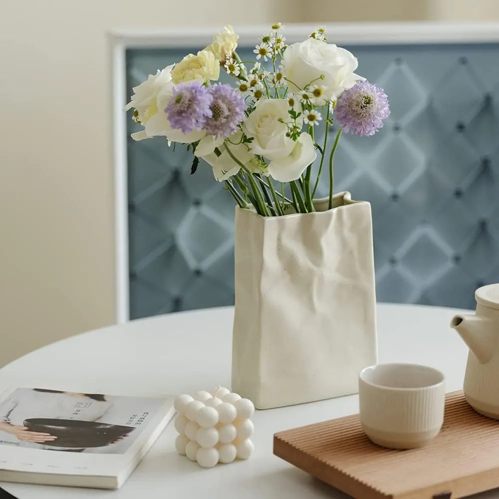 Elegant Ceramic Vase with Textured Paper Bag Design