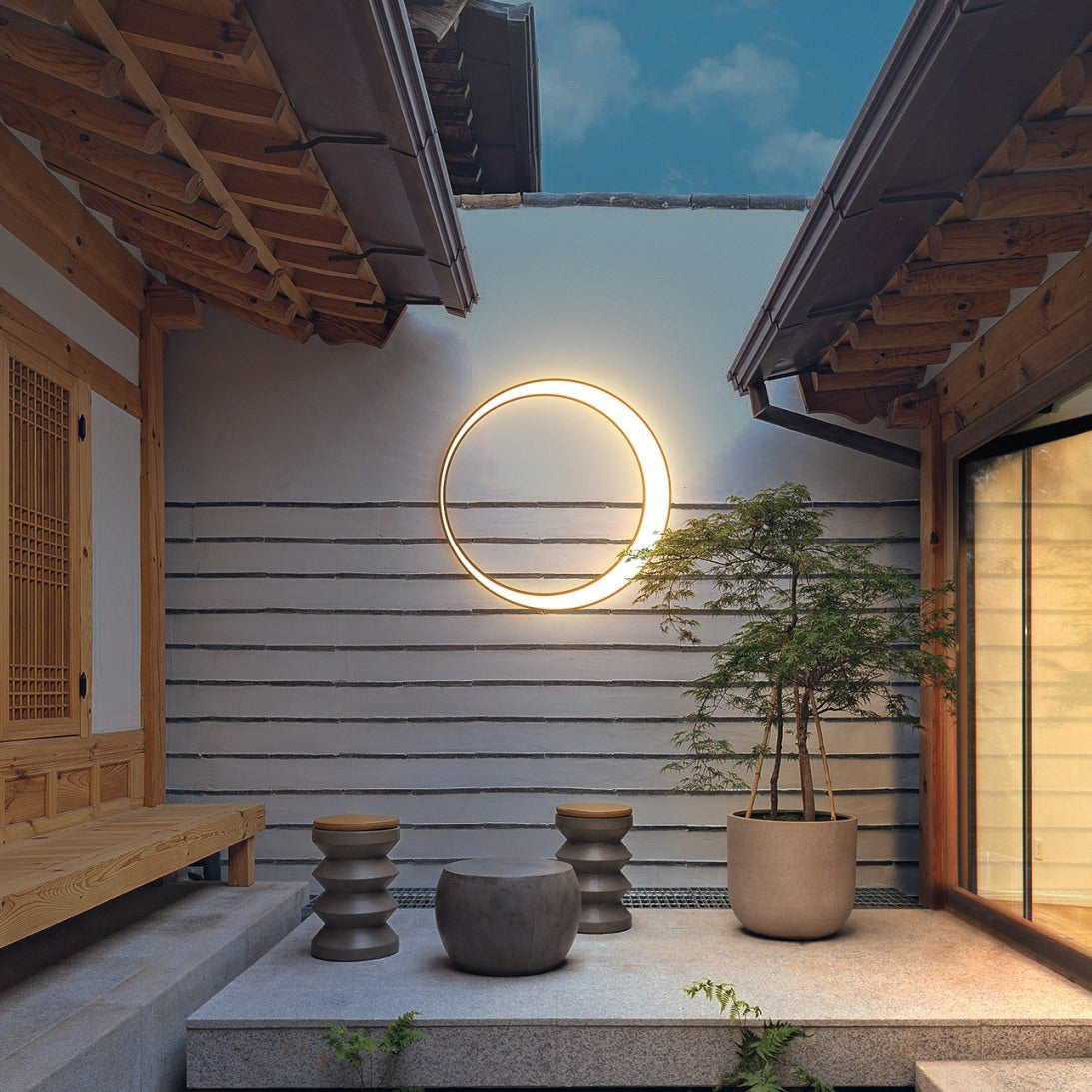 Elegant Circular Outdoor Wall Fixture with Halo Glow