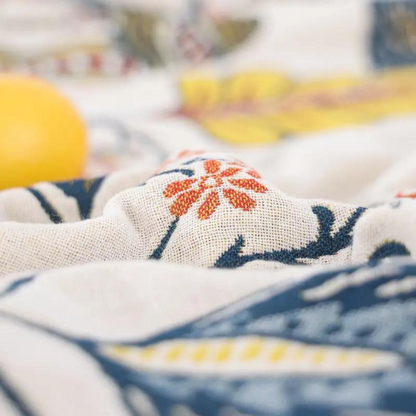 Elegant Botanical Cotton Throw with Charming Tassels