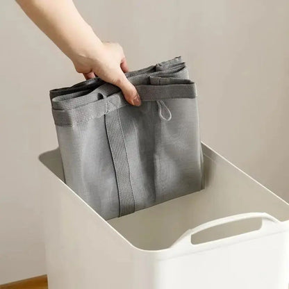 Compact Mesh Laundry Storage Solution